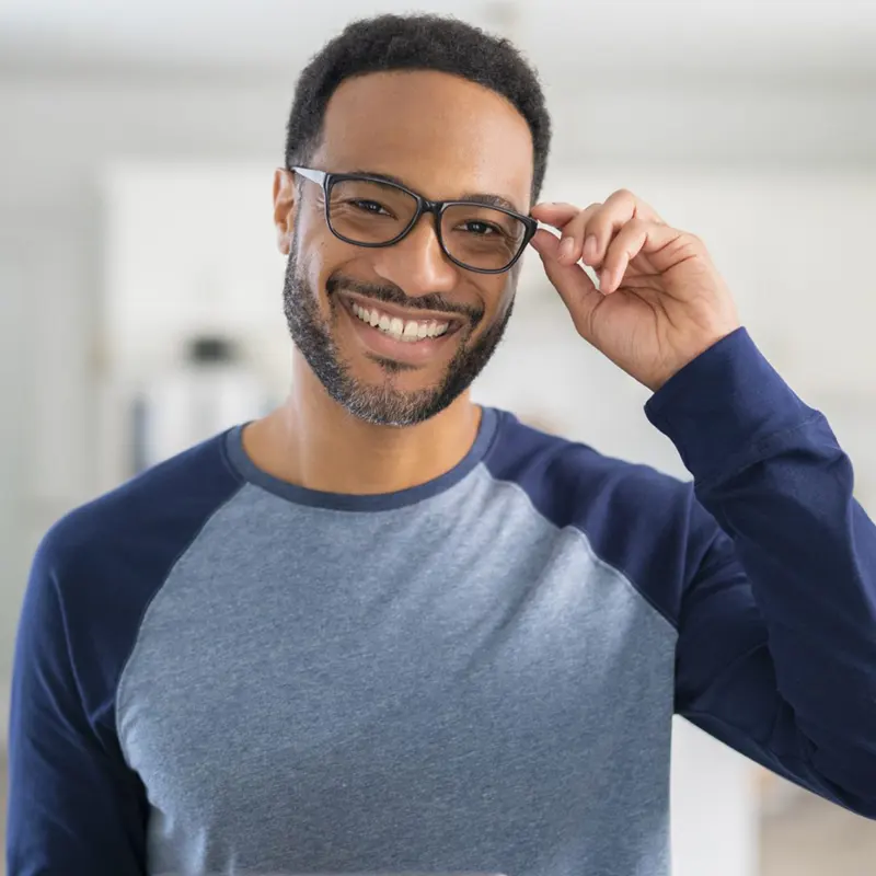 Man enjoying relief with Neurolens glasses.