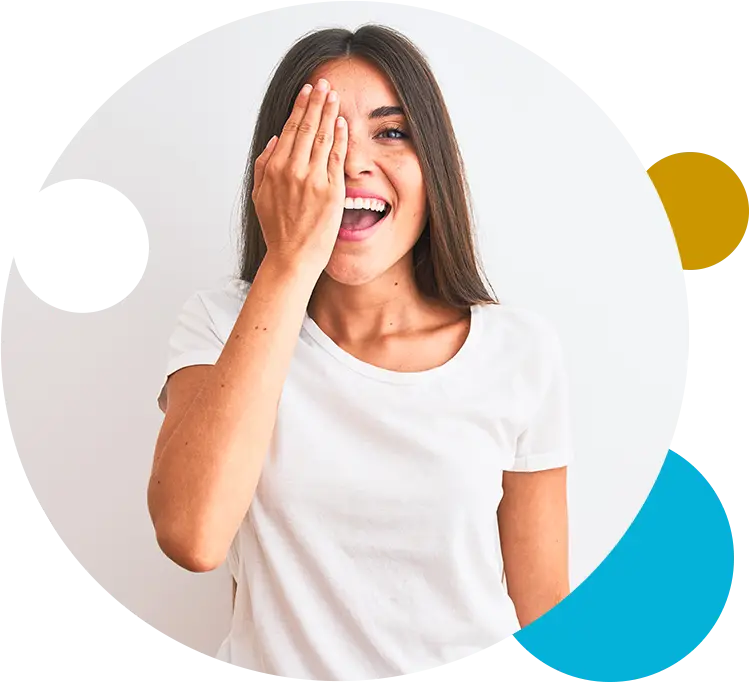 Young woman with hand over her eye for eye exam.